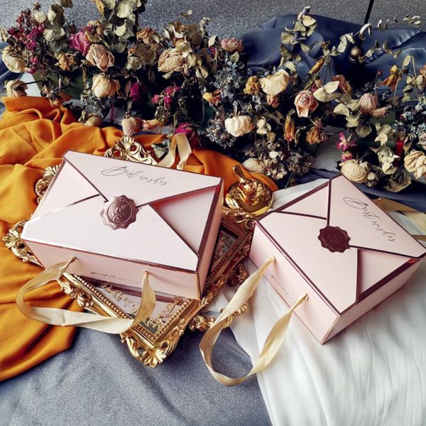 gift wrap 1pcs christmas candy chocolate paper box wedding packaging with ribbon protable gifts bag party favors
gift wrap 1pcs christmas candy chocolate paper box wedding packaging with ribbon protable gifts bag party favors