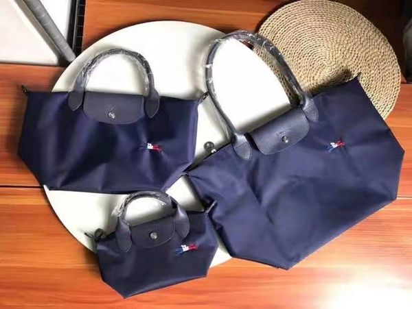 luxury handbags 2021 new thickened waterproof nylon cloth with leather embroidery messenger dumpling women's shoulder bag
luxury handbags 2021 new thickened waterproof nylon cloth with leather embroidery messenger dumpling women's shoulder bag