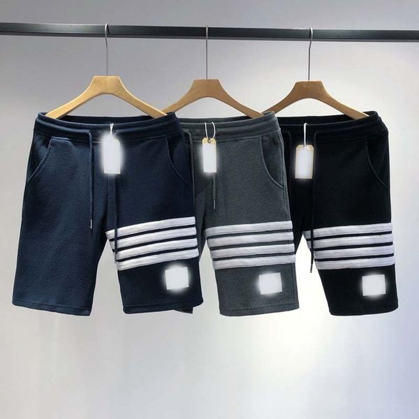 2021 trend new men's and women's tb waffle shorts korean loose cotton casual sports capris for lovers, White;black 
2021 trend new men's and women's tb waffle shorts korean loose cotton casual sports capris for lovers, White;black