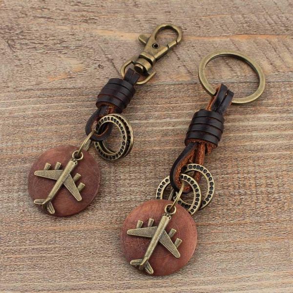 keychains vintage key chain handmade leather keychain round wood bronze airplane pendant creative car ring, Silver
keychains vintage key chain handmade leather keychain round wood bronze airplane pendant creative car ring, Silver