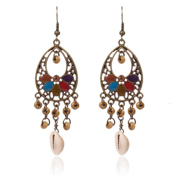earring style oil dripping wood beads shell alloy multi element tassel scenic area earrings, Golden
earring style oil dripping wood beads shell alloy multi element tassel scenic area earrings, Golden