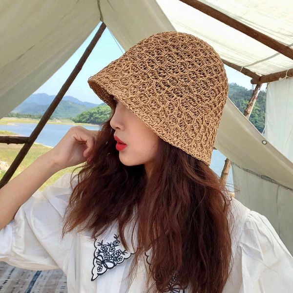 dongdamen style ~ designer fisherman's female bell shaped bucket hat double layer hollow woven straw
dongdamen style ~ designer fisherman's female bell shaped bucket hat double layer hollow woven straw