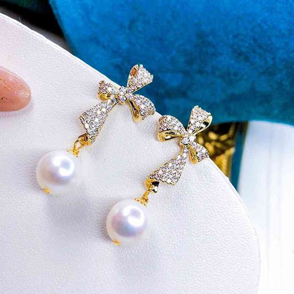 natural temperament fresh pearl earrings court style full diamond water drop bow earrings female 925 silver needle, Black
natural temperament fresh pearl earrings court style full diamond water drop bow earrings female 925 silver needle, Black