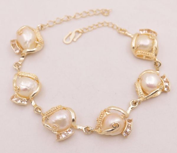beaded, strands 8-9" long 12mm real pink baroque pearl inlay glass crystal golden alloy bracelet, Black
beaded, strands 8-9" long 12mm real pink baroque pearl inlay glass crystal golden alloy bracelet, Black
