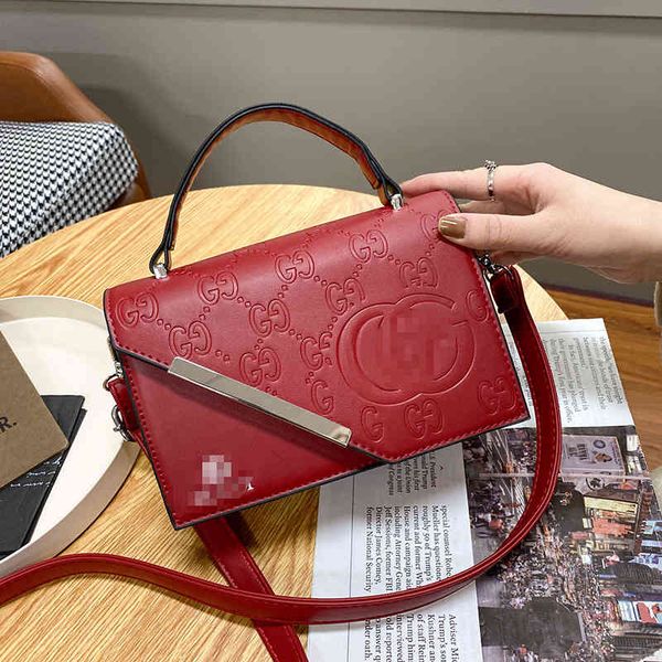 new women's bag version hand-held embossed small square fashionable atmosphere single shoulder diagonal span simple and purses
new women's bag version hand-held embossed small square fashionable atmosphere single shoulder diagonal span simple and purses
