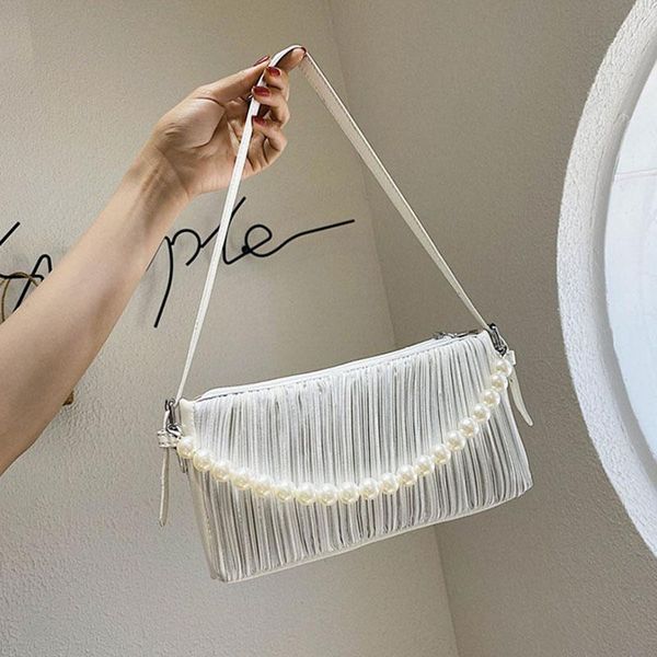 folds design luxury pearls shoulder bags for women 2021 summer female fashion wild solid color handbags lady armpit bag tote evening
folds design luxury pearls shoulder bags for women 2021 summer female fashion wild solid color handbags lady armpit bag tote evening