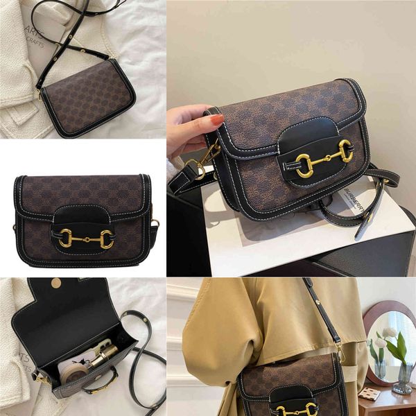design spring frosted small square bag simple wide shoulder strap sling classic tofu horse rank buckle shaped saddle purses outlet
design spring frosted small square bag simple wide shoulder strap sling classic tofu horse rank buckle shaped saddle purses outlet