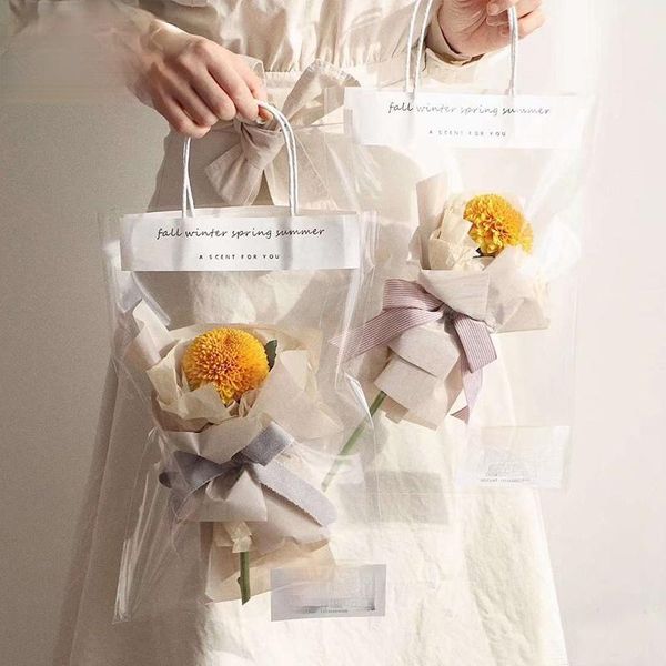 simple transparent hand-held flower bag for festival gift small bouquets packaging material wrap
simple transparent hand-held flower bag for festival gift small bouquets packaging material wrap