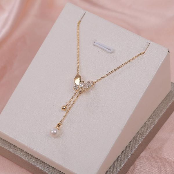 pendant necklaces cute fahsion style women's sweet pearl butterfly tassel design necklace zircon simple jewelry accessory, Silver
pendant necklaces cute fahsion style women's sweet pearl butterfly tassel design necklace zircon simple jewelry accessory, Silver