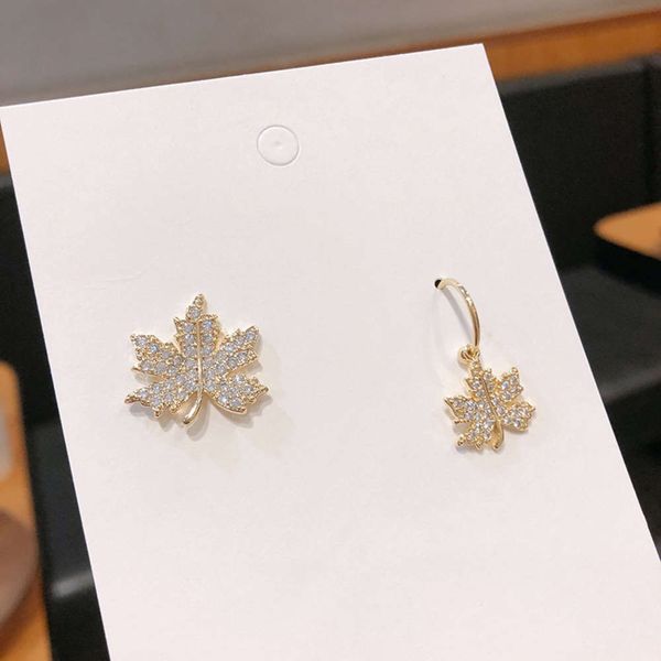 korean super fairy temperament micro inlaid zircon maple leaf creative asymmetric s925 silver needle forest earrings female trend, Black
korean super fairy temperament micro inlaid zircon maple leaf creative asymmetric s925 silver needle forest earrings female trend, Black