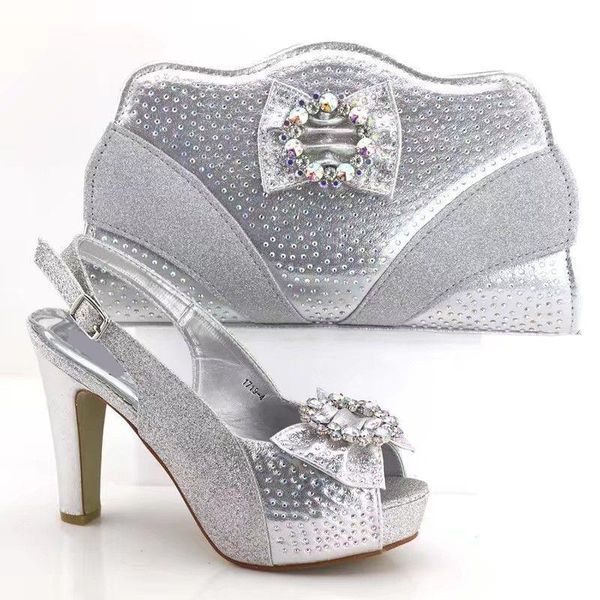 silver women pumps and bag set with rhinestone bowtie design african shoes match handbag for dress v1719-4, Black
silver women pumps and bag set with rhinestone bowtie design african shoes match handbag for dress v1719-4, Black