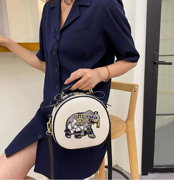 factory wholesale brand women shoulder bag sweet round elephant cartoon leather handbag street trend sequin embroidery messenger bags person, Black;red
factory wholesale brand women shoulder bag sweet round elephant cartoon leather handbag street trend sequin embroidery messenger bags person, Black;red