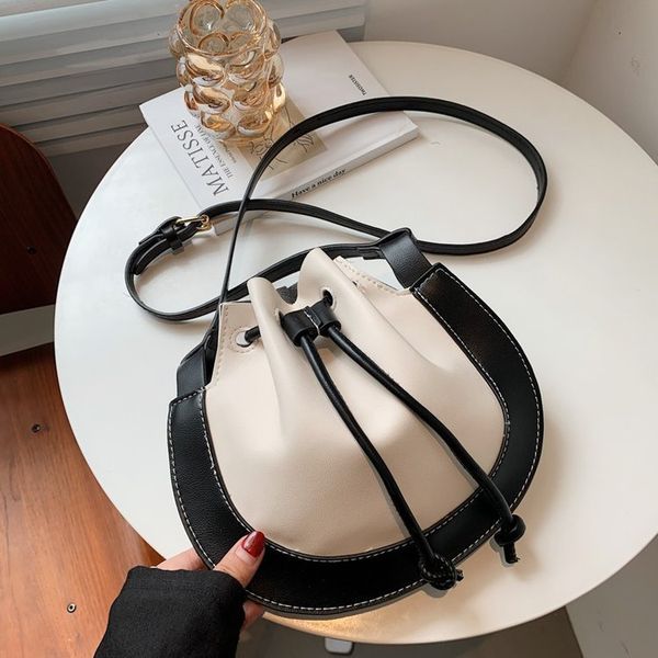 designer bags 2021 saddle color matching simple european fashion women's drawstring horseshoe bag single shoulder messenger bag
designer bags 2021 saddle color matching simple european fashion women's drawstring horseshoe bag single shoulder messenger bag