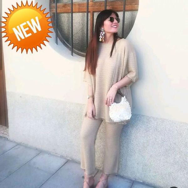 women's sweaters camel autumn color knitted sweater women style o neck half sleeve tassels rough edge stylish casual loose femme, White;black
women's sweaters camel autumn color knitted sweater women style o neck half sleeve tassels rough edge stylish casual loose femme, White;black