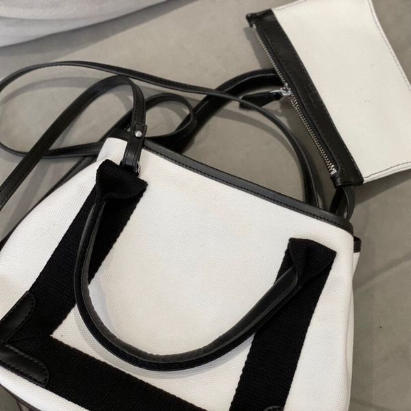 designer handbags simple high-end design black and white leather patchwork canvas bag letter decorative large capacity composite bags should
designer handbags simple high-end design black and white leather patchwork canvas bag letter decorative large capacity composite bags should