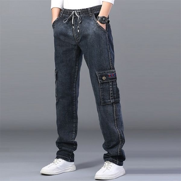 men's high waist jeans straight large size dinem trouser male black jeans side multi pocket blue loose elastic band cargo pants 211104
men's high waist jeans straight large size dinem trouser male black jeans side multi pocket blue loose elastic band cargo pants 211104