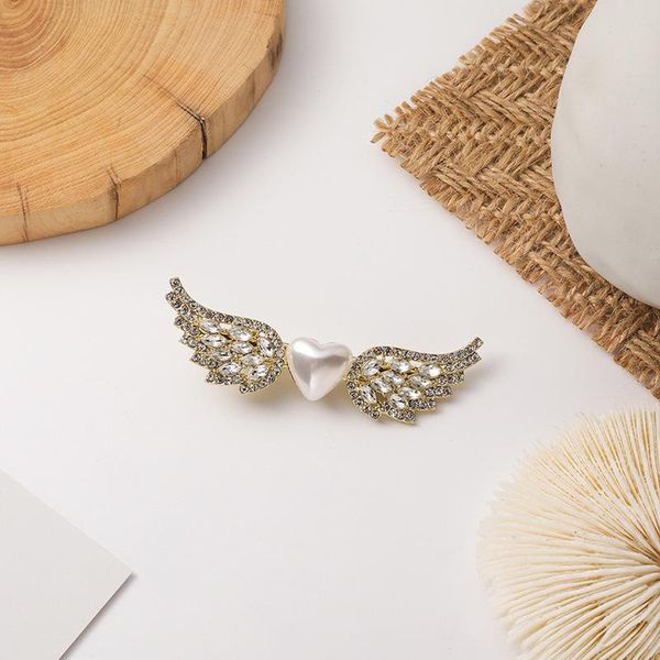 korea sweet bling rhinestone simulation wing barrettes for women heart shape imitation pearl clip hairpins hair accessories
korea sweet bling rhinestone simulation wing barrettes for women heart shape imitation pearl clip hairpins hair accessories