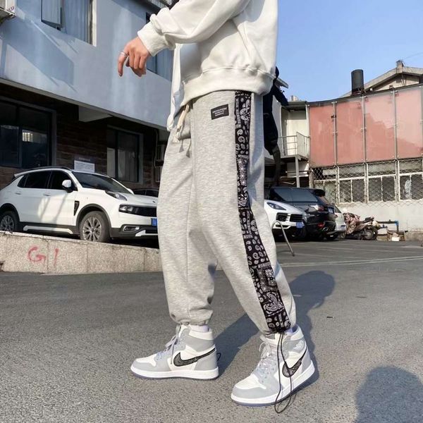 men's casual pants summer trend hip hop cashew flower stitching sports loose legged, White;black
men's casual pants summer trend hip hop cashew flower stitching sports loose legged, White;black