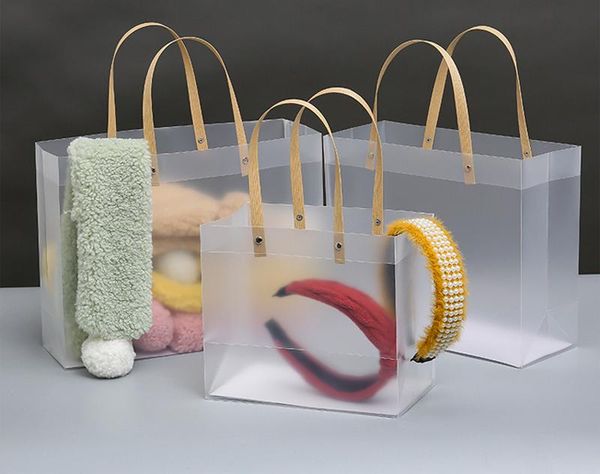 10pcs high-quality semitransparent plastic bag frosted pp bags with paper handle hard package gift candy advertising wrap
10pcs high-quality semitransparent plastic bag frosted pp bags with paper handle hard package gift candy advertising wrap