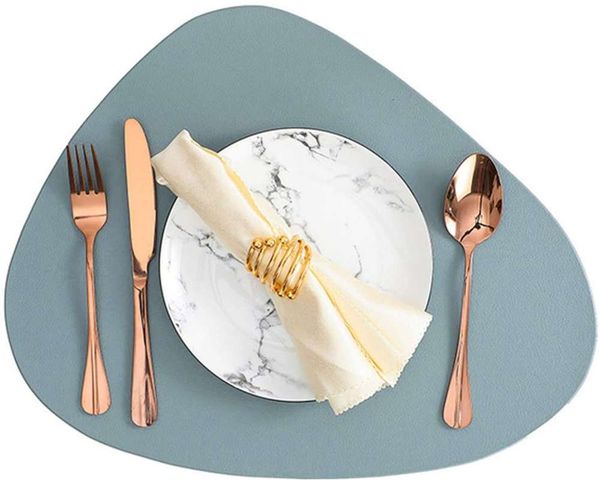 european simple western table mat leather waterproof heat insulation different goose soft stone shape
european simple western table mat leather waterproof heat insulation different goose soft stone shape