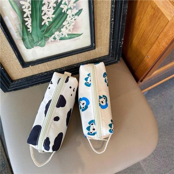storage bags fashion dairy cow pattern pencil pouch with lanyard nylon makeup cosmetic bag for students
storage bags fashion dairy cow pattern pencil pouch with lanyard nylon makeup cosmetic bag for students