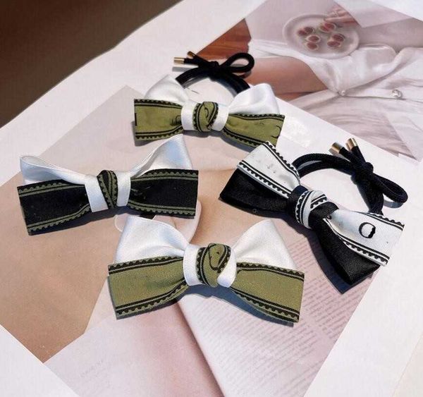 2021 japan and south korea temperament simple letter hair circle retro fabric black white army green double bow hairpin headdress female, Pink
2021 japan and south korea temperament simple letter hair circle retro fabric black white army green double bow hairpin headdress female, Pink