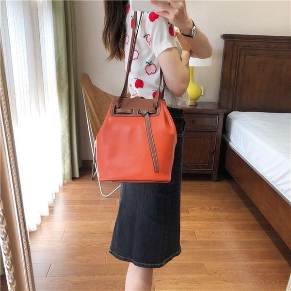 evening bags leather 2021 women's bag color contrast design texture bucket fashion large capacity one shoulder handbag
evening bags leather 2021 women's bag color contrast design texture bucket fashion large capacity one shoulder handbag