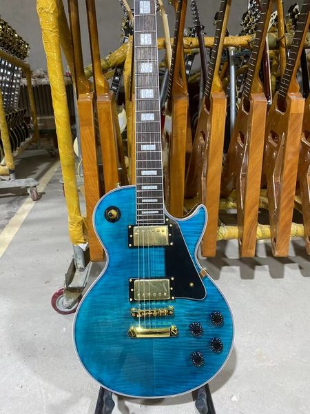 custom electric guitar golden hardware flamed maple rosewood fingeboard mahogany body
custom electric guitar golden hardware flamed maple rosewood fingeboard mahogany body
