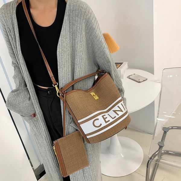 factory direct sale 75% off arc child mother bucket large capacity one shoulder messenger straw woven bags
factory direct sale 75% off arc child mother bucket large capacity one shoulder messenger straw woven bags
