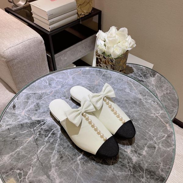 slippers 2021 ladies jewelry pearl bow leather half designer, Black
slippers 2021 ladies jewelry pearl bow leather half designer, Black