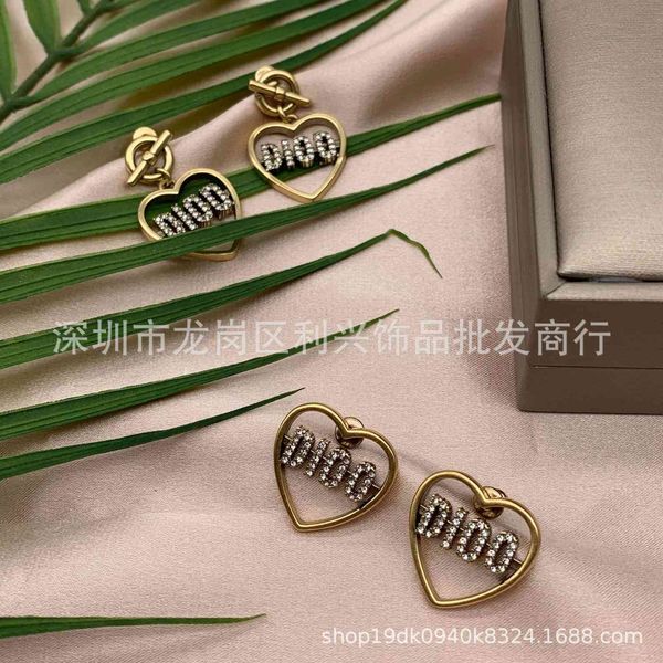 d family earrings s925 sier needle flavone peach heart letter diamond female ins versatile temperament, Golden
d family earrings s925 sier needle flavone peach heart letter diamond female ins versatile temperament, Golden