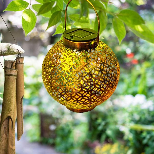 solar lamps wrought iron hollow lamp projector outdoor decorative landscape garden metal led portable lantern 
solar lamps wrought iron hollow lamp projector outdoor decorative landscape garden metal led portable lantern