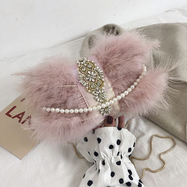 style turkey ostrich hair slant across women's korean fashion pearl chain inlaid with diamond dinner fur bag
style turkey ostrich hair slant across women's korean fashion pearl chain inlaid with diamond dinner fur bag