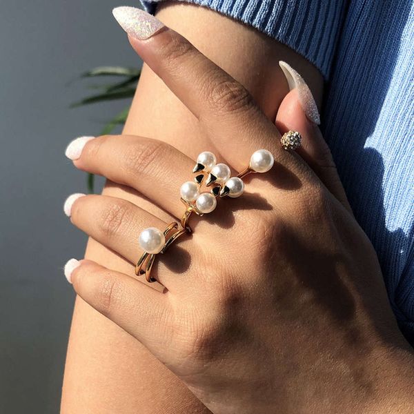 r0286ins fashion female personality imitation pearl inlaid diamond niche design set tail ring, Black
r0286ins fashion female personality imitation pearl inlaid diamond niche design set tail ring, Black