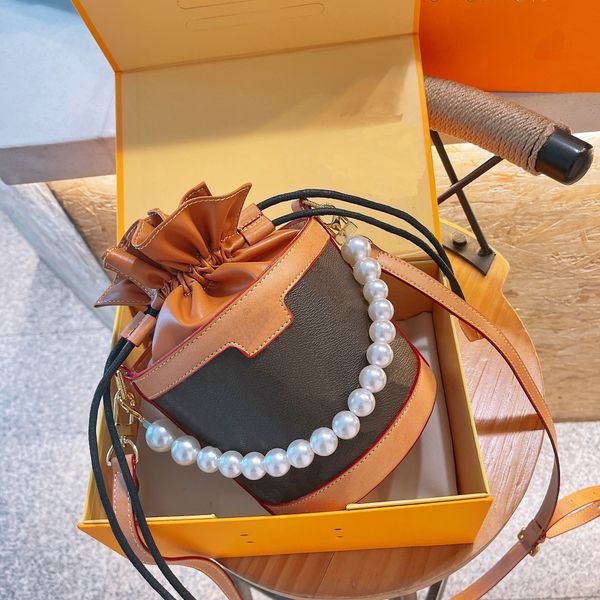 fashion leather stitched round bucket bag drawstring women's shoulder bags pearl string handle dinner party handbag classic printing
fashion leather stitched round bucket bag drawstring women's shoulder bags pearl string handle dinner party handbag classic printing