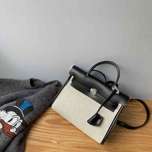double sided color contrast cloth women's new large capacity simple kelly versatile portable canvas bag fashion
double sided color contrast cloth women's new large capacity simple kelly versatile portable canvas bag fashion