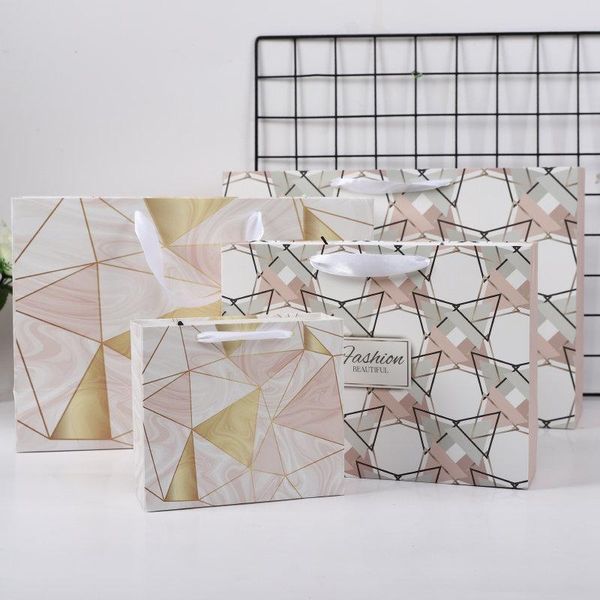 10pcs/lot arrive geometric patterns marble gift bag box for party baby shower paper chocolate boxes package/wedding favours wrap
10pcs/lot arrive geometric patterns marble gift bag box for party baby shower paper chocolate boxes package/wedding favours wrap