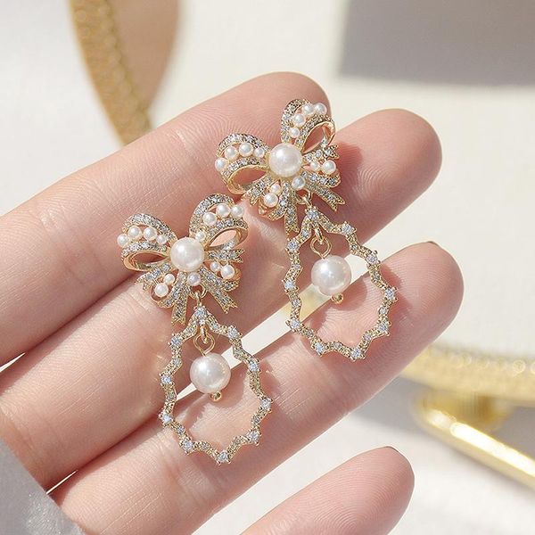 stud elegant hollow bowknot pearl earrings for women inlaid zircon temperament earring wedding bridal jewelry accessories, Golden;silver
stud elegant hollow bowknot pearl earrings for women inlaid zircon temperament earring wedding bridal jewelry accessories, Golden;silver