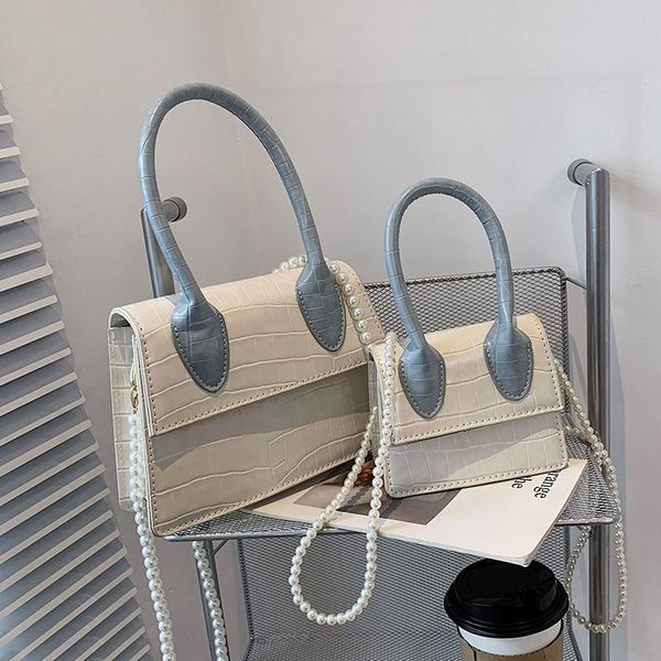 summer western style contrast color pearl handbag 2021 fashion chain women's designer stone grain texture messenger bag shoulder bags
summer western style contrast color pearl handbag 2021 fashion chain women's designer stone grain texture messenger bag shoulder bags
