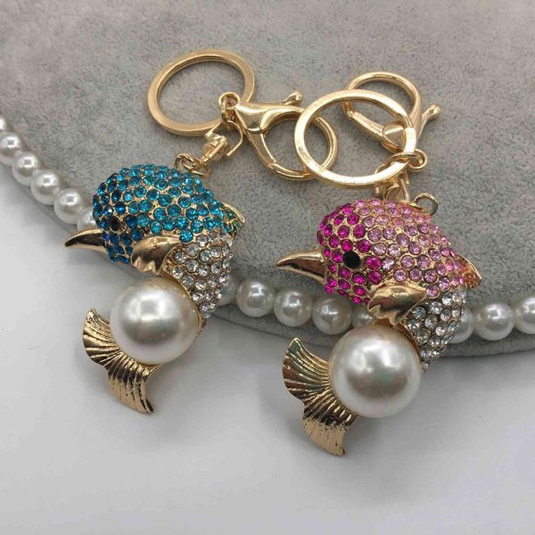 korean creative luxury pearl 0rhine-stone dolphin car metal ocean pendant women's key chain, Slivery;golden
korean creative luxury pearl 0rhine-stone dolphin car metal ocean pendant women's key chain, Slivery;golden