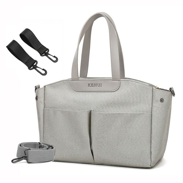 mommy diaper bag women's shoulder messenger mom travel stroller baby storage care 211025
mommy diaper bag women's shoulder messenger mom travel stroller baby storage care 211025