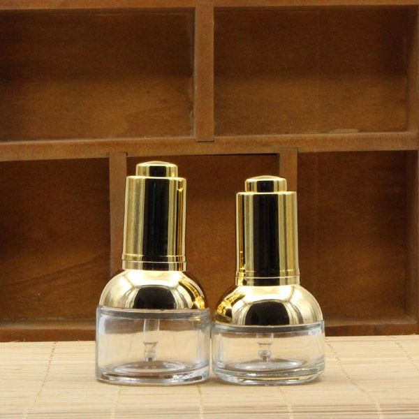 20ml30ml elite fluid transparent glass shoulder packing bottle(press dropper/golden or silver plastic holster) storage bottles & jars
20ml30ml elite fluid transparent glass shoulder packing bottle(press dropper/golden or silver plastic holster) storage bottles & jars