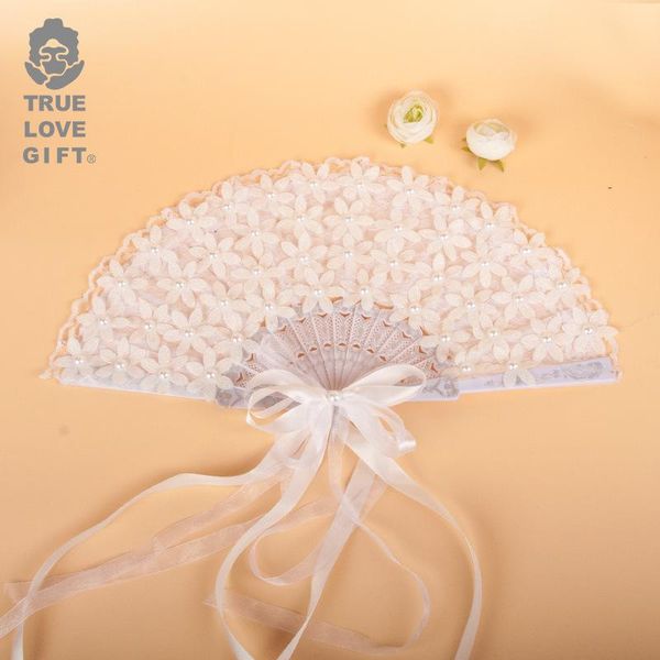 party decoration wedding creative decorative flowers bride hand holding fan lace and feathers
party decoration wedding creative decorative flowers bride hand holding fan lace and feathers