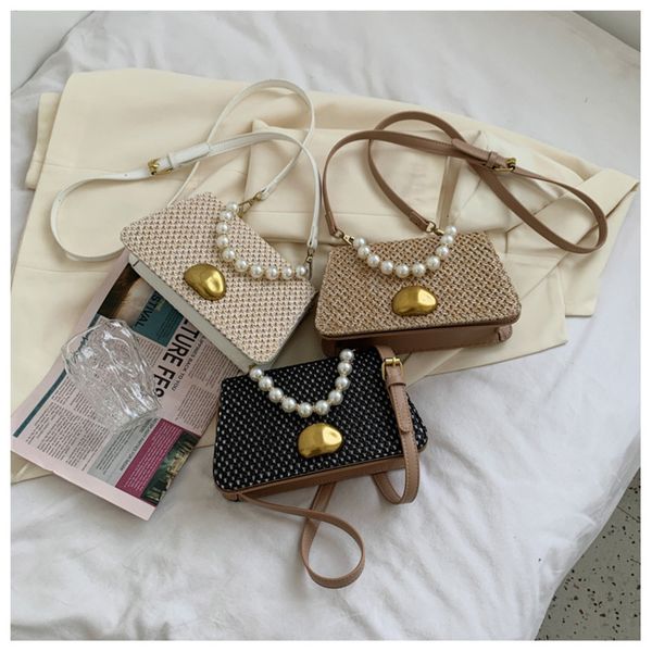2021 portable fashion straw small square bag personalized spring and summer one shoulder messenger chain woven women's
2021 portable fashion straw small square bag personalized spring and summer one shoulder messenger chain woven women's