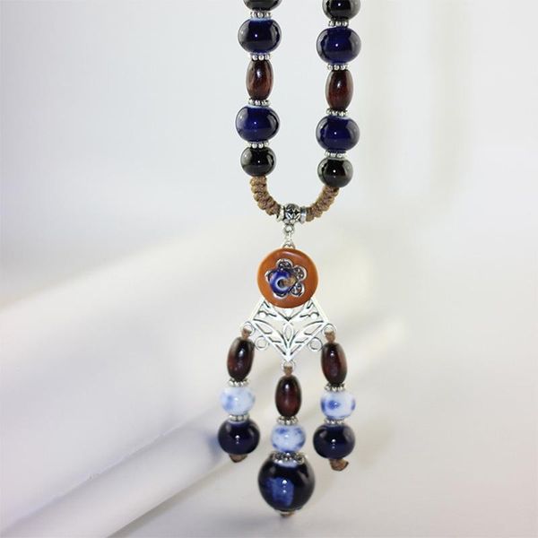 pieces/lotsilver hollow flower necklace long tassel sweater charm statement choker ceramic round beads women fashion jewelry pendant necklac, Silver
pieces/lotsilver hollow flower necklace long tassel sweater charm statement choker ceramic round beads women fashion jewelry pendant necklac, Silver