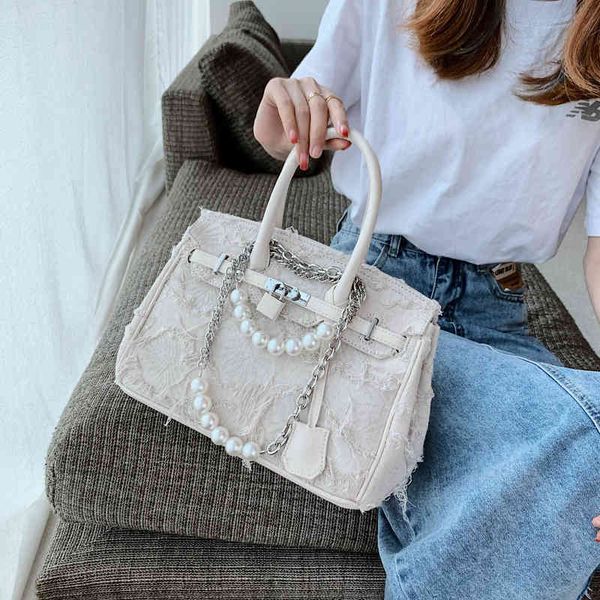 japanese niche vintage denim stitching beggar army canvas kelly hand bag fashion
japanese niche vintage denim stitching beggar army canvas kelly hand bag fashion