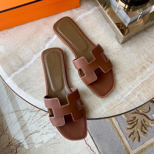 wholesale 2021 women fashion designerss flat slides flops summer beach slippers designers sandals genuine leathe shoes large size 35-41-42 y, Black
wholesale 2021 women fashion designerss flat slides flops summer beach slippers designers sandals genuine leathe shoes large size 35-41-42 y, Black