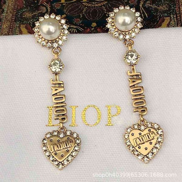 75% off outlet online 2021 new pearl love letter women's earrings, Golden 
75% off outlet online 2021 new pearl love letter women's earrings, Golden