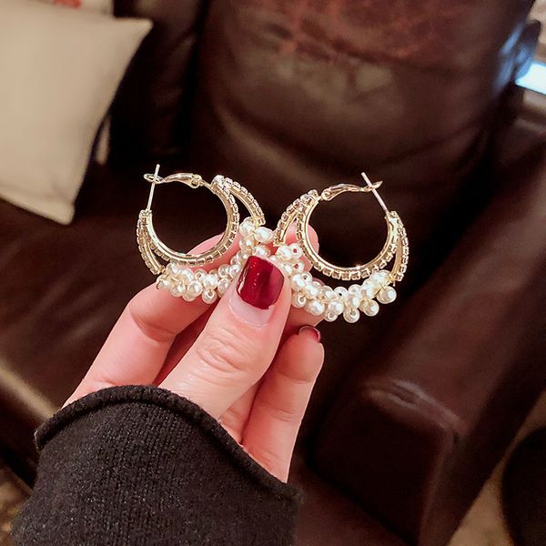 925 silver needle designer east gate geometric circle earrings artistic temperament wrapped with pearl celebrity diamond earrings
925 silver needle designer east gate geometric circle earrings artistic temperament wrapped with pearl celebrity diamond earrings