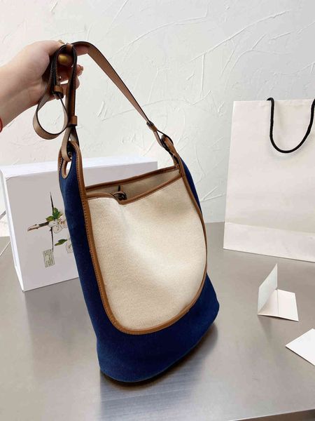 luxury handbags luo's parents' splicing bucket bag canvas collage leather double back fashion shopping one shoulder bag
luxury handbags luo's parents' splicing bucket bag canvas collage leather double back fashion shopping one shoulder bag